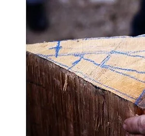 Le traçage des merrains dans un quart de grume